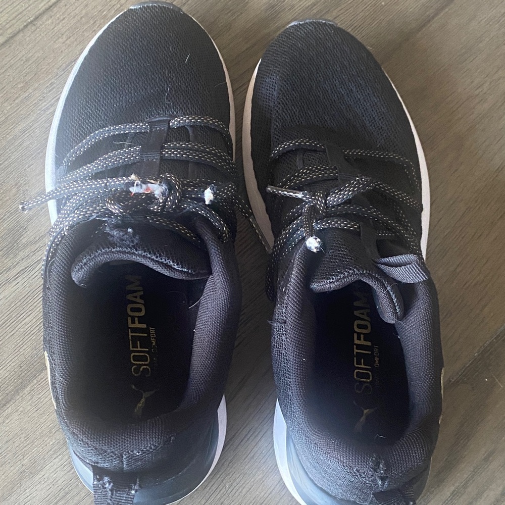 Puma womens Black and White SoftFoam+ Athletic Sneakers